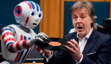 Paul Mccartney junto a robot de IA.