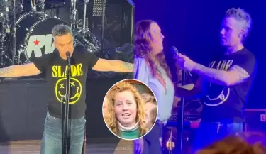 Robbie Williams sube a escenario a fan que le grit� su n�mero hace 30 a�os.